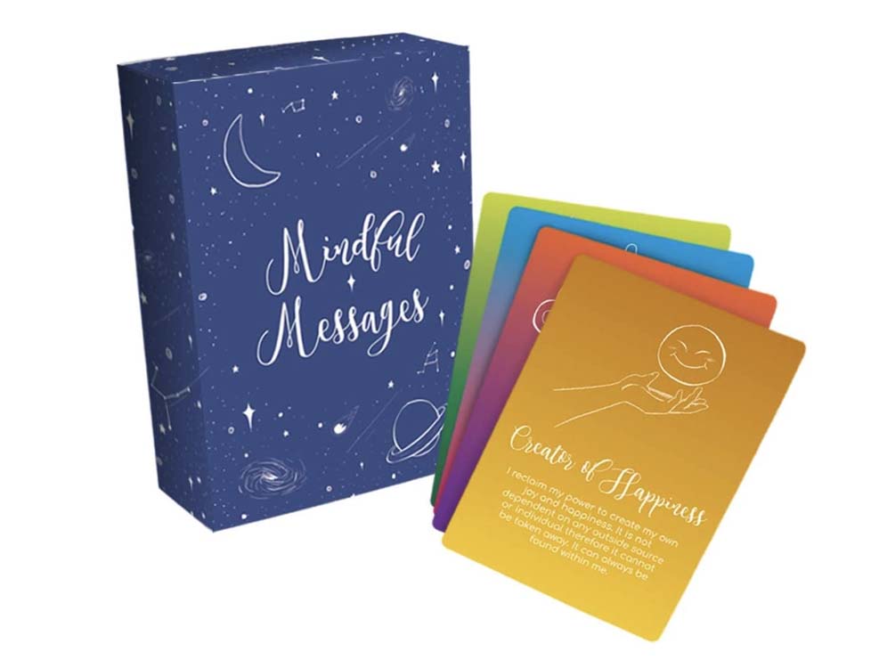 Affirmation cards next to box